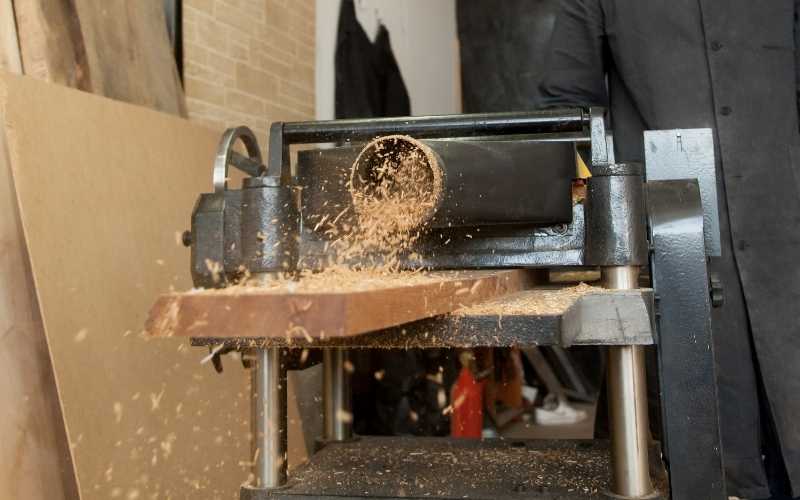 a wood planer in use